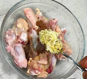 picture of ginger and garli been added to thicken for sweet chicken combo recipe