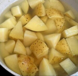 wash, cut and cook your potatoes
