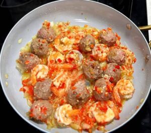 add your prawn and fresh pepper and other ingredients and cook