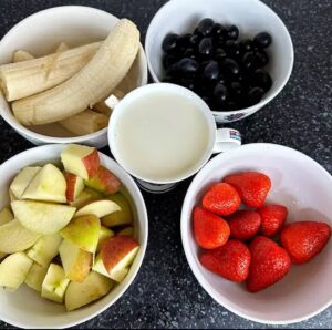 wash all the fruits and slice the ones that needs to be sliced