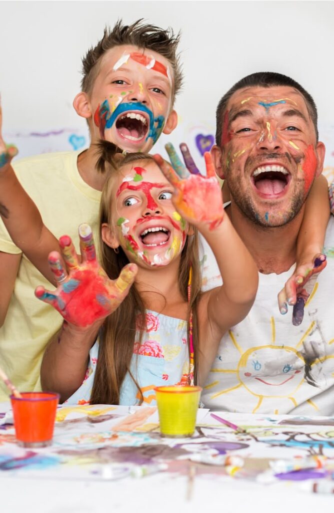 daddy painting with his kids