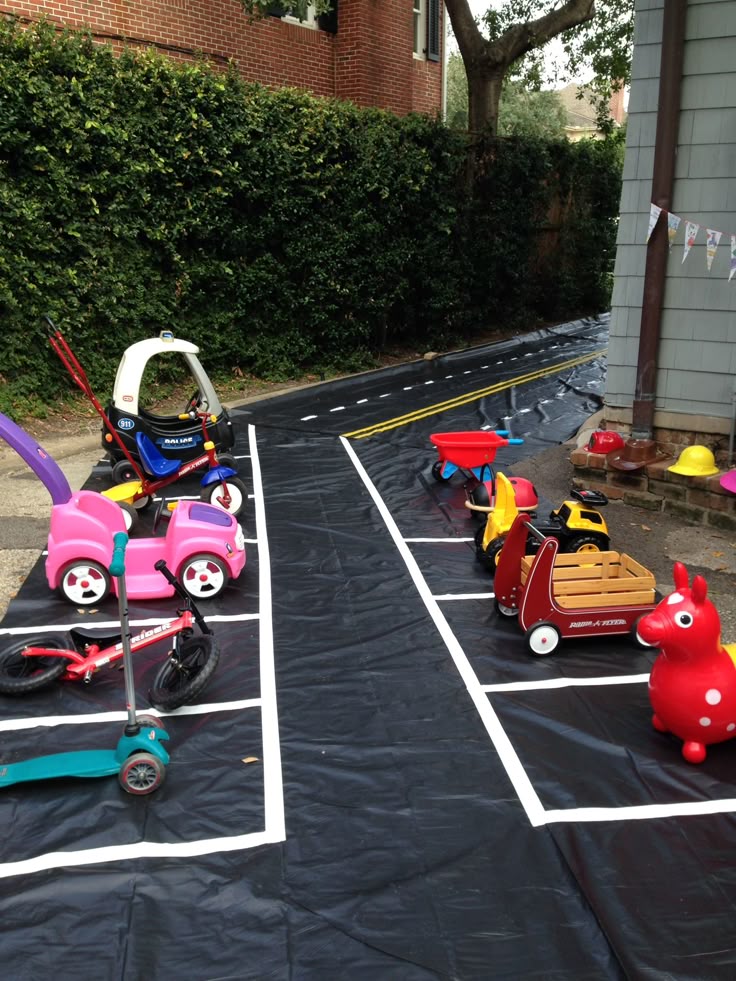 Rolling Large Toy Cars Along a Path